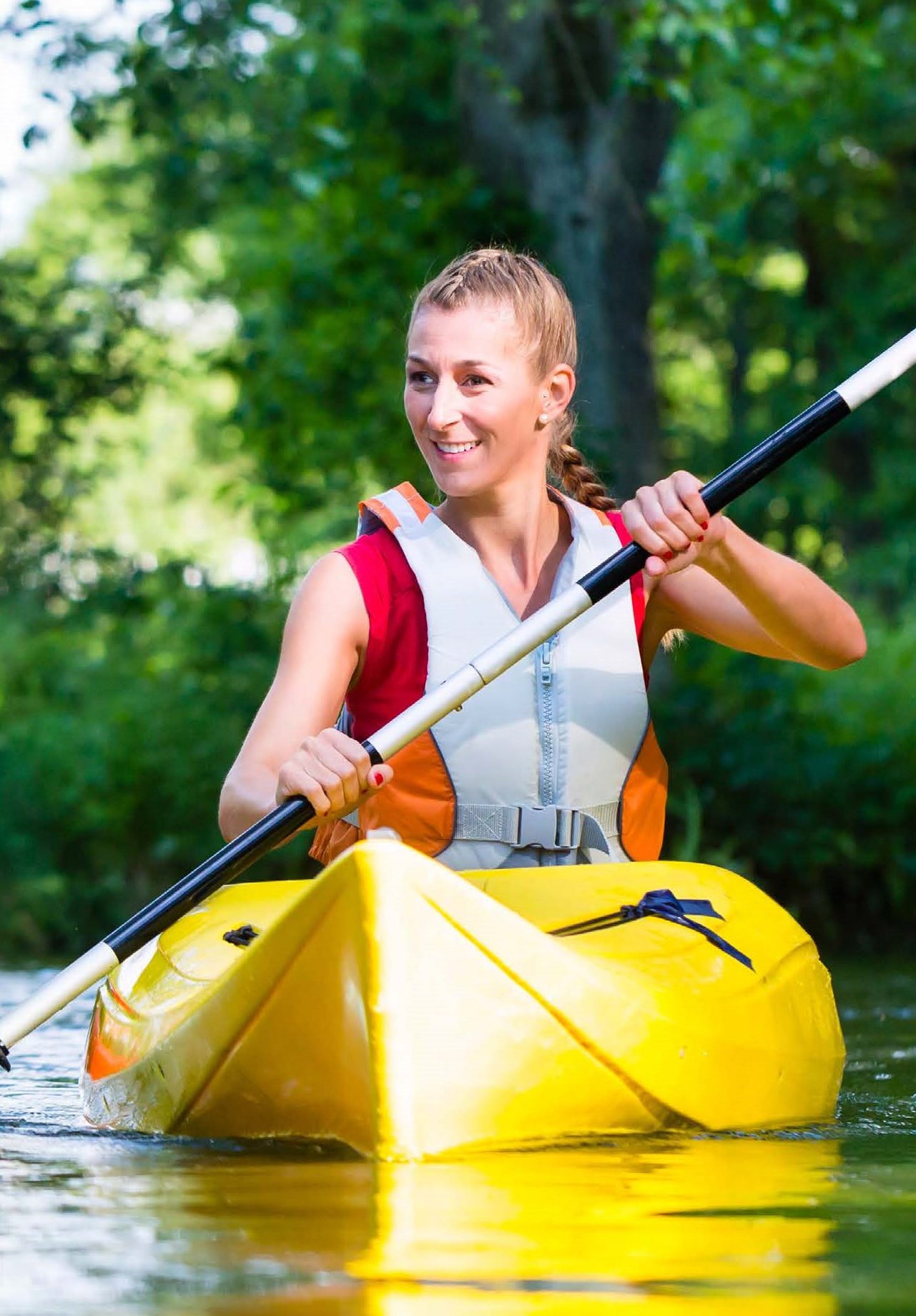 Woman canoeing on river | Active Gloucestershire